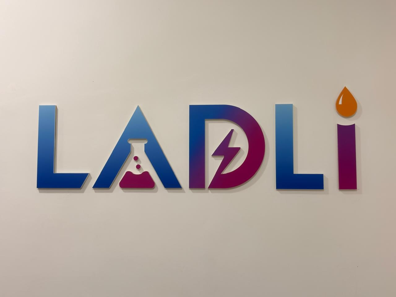 LADLI logo displayed on the laboratory wall